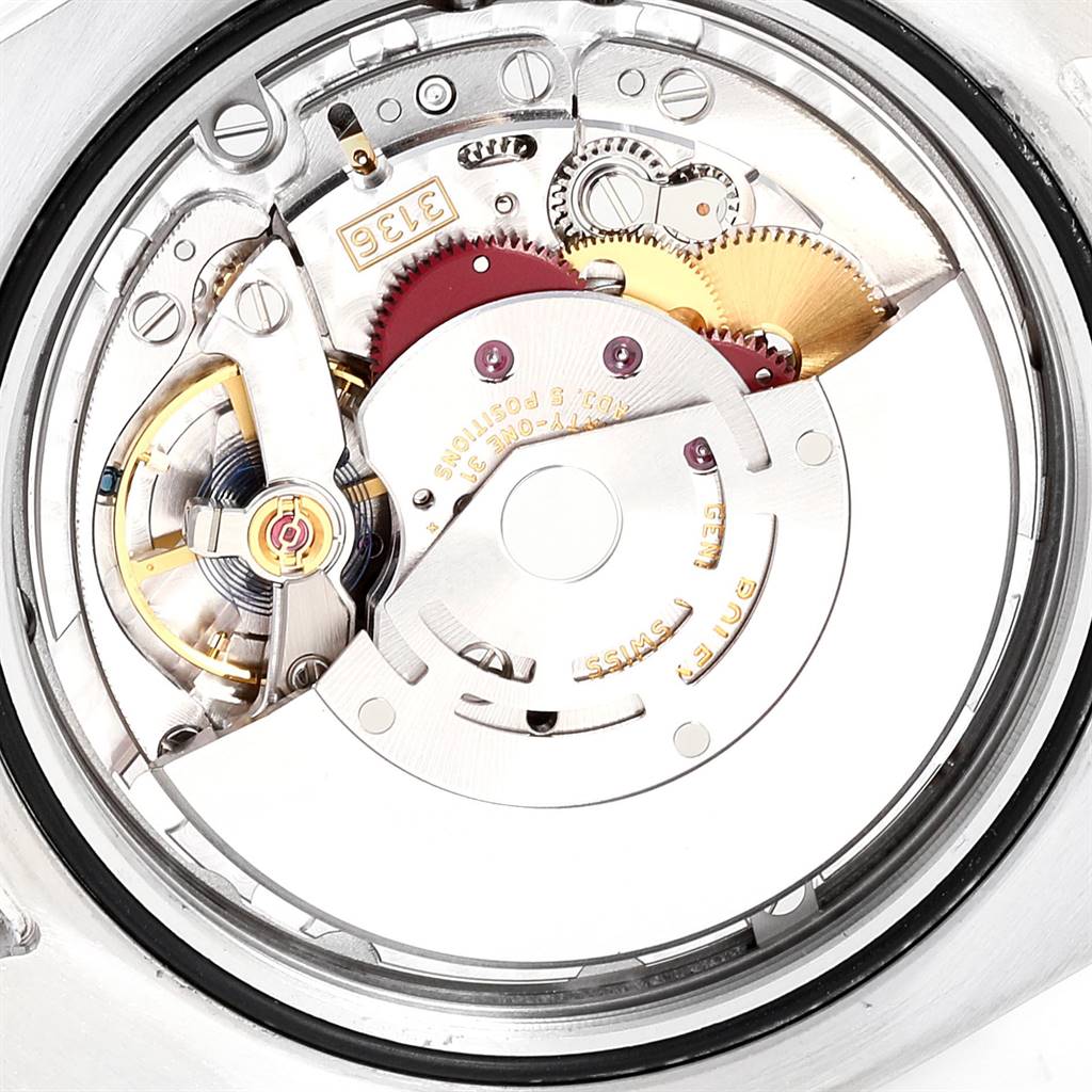 The image shows the intricate movement parts of the Rolex Datejust 41 116300 Men
s Stainless Steel Blue Dial 116300 Men
s Stainless Steel Blue Dial watch from a back angle.