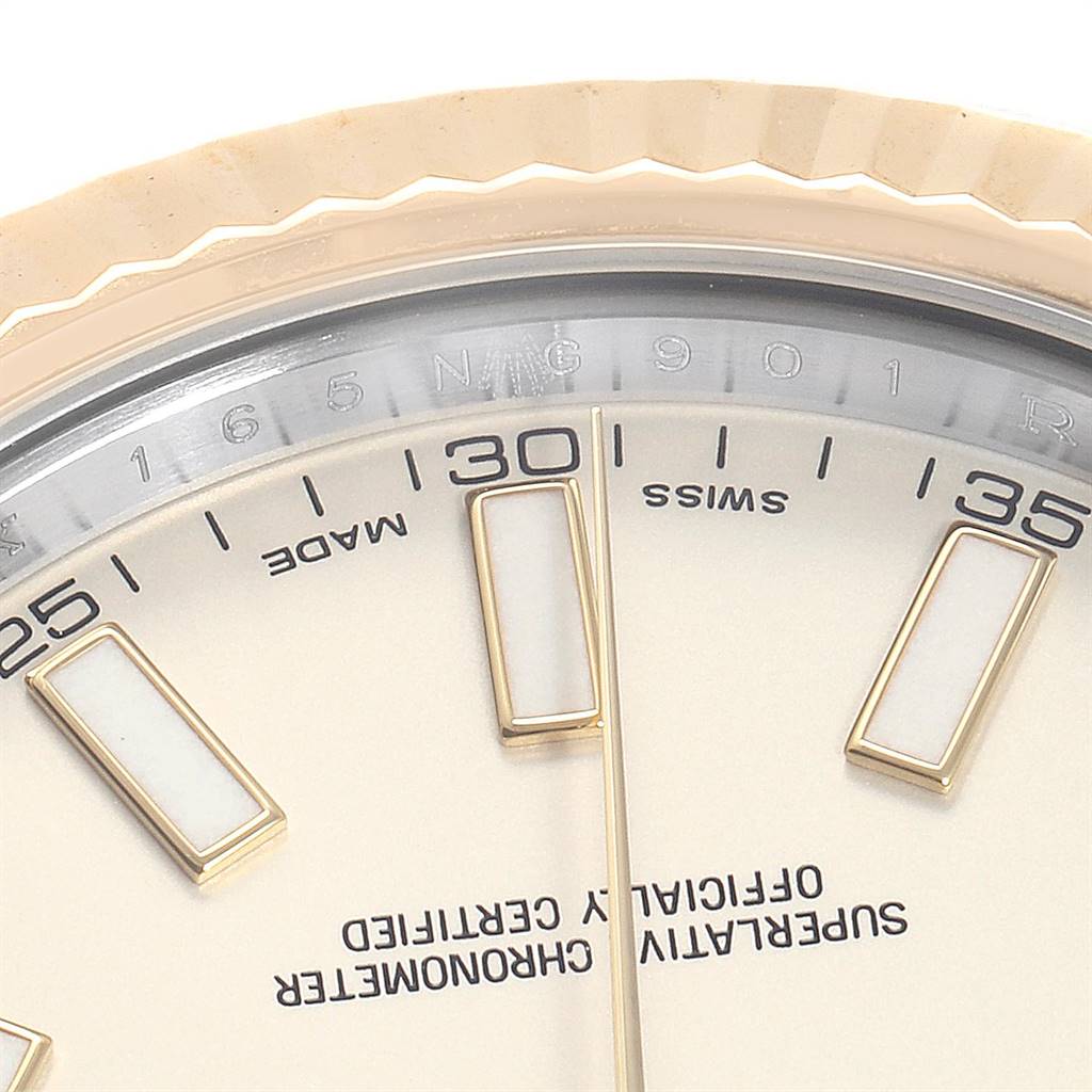 This image showcases the upper half of the dial and bezel of a Rolex Datejust 41 116333 Men's Steel and Gold (two tone) Silver Dial 116333 Men's Steel and Gold (two tone) Silver Dial watch.