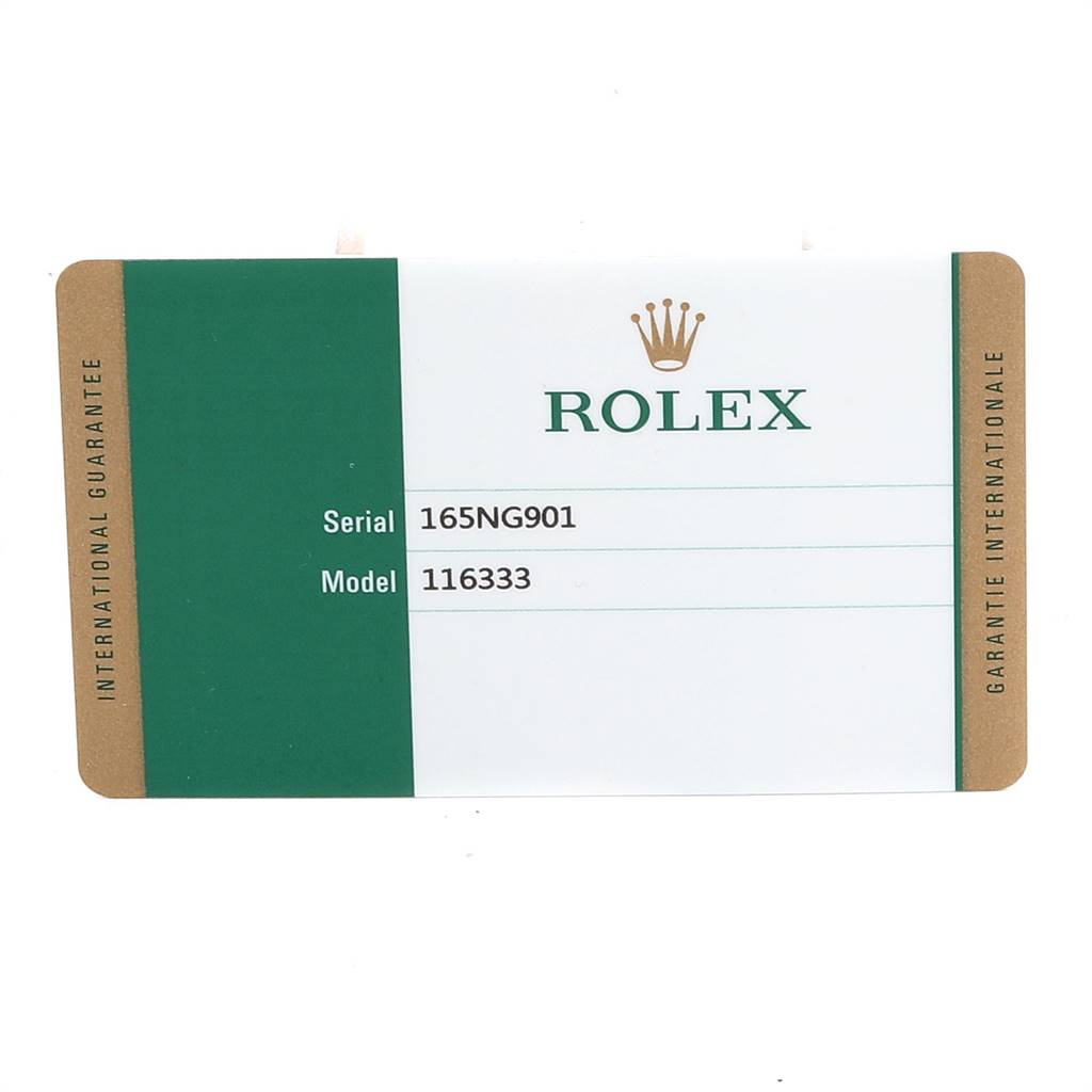 This is a Rolex Datejust 41 116333 Men's Steel and Gold (two tone) Silver Dial 116333 Men's Steel and Gold (two tone) Silver Dial international guarantee card shown from a top-down view.