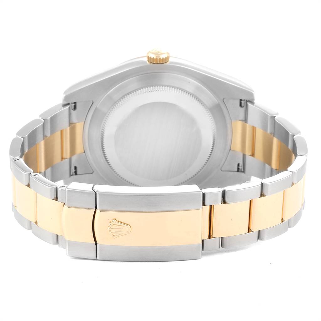 The image shows the back view of a Rolex Datejust 41 116333 Men's Steel and Gold (two tone) Silver Dial 116333 Men's Steel and Gold (two tone) Silver Dial watch, highlighting the case back and the two-tone bracelet with the Rolex crown on the clasp.