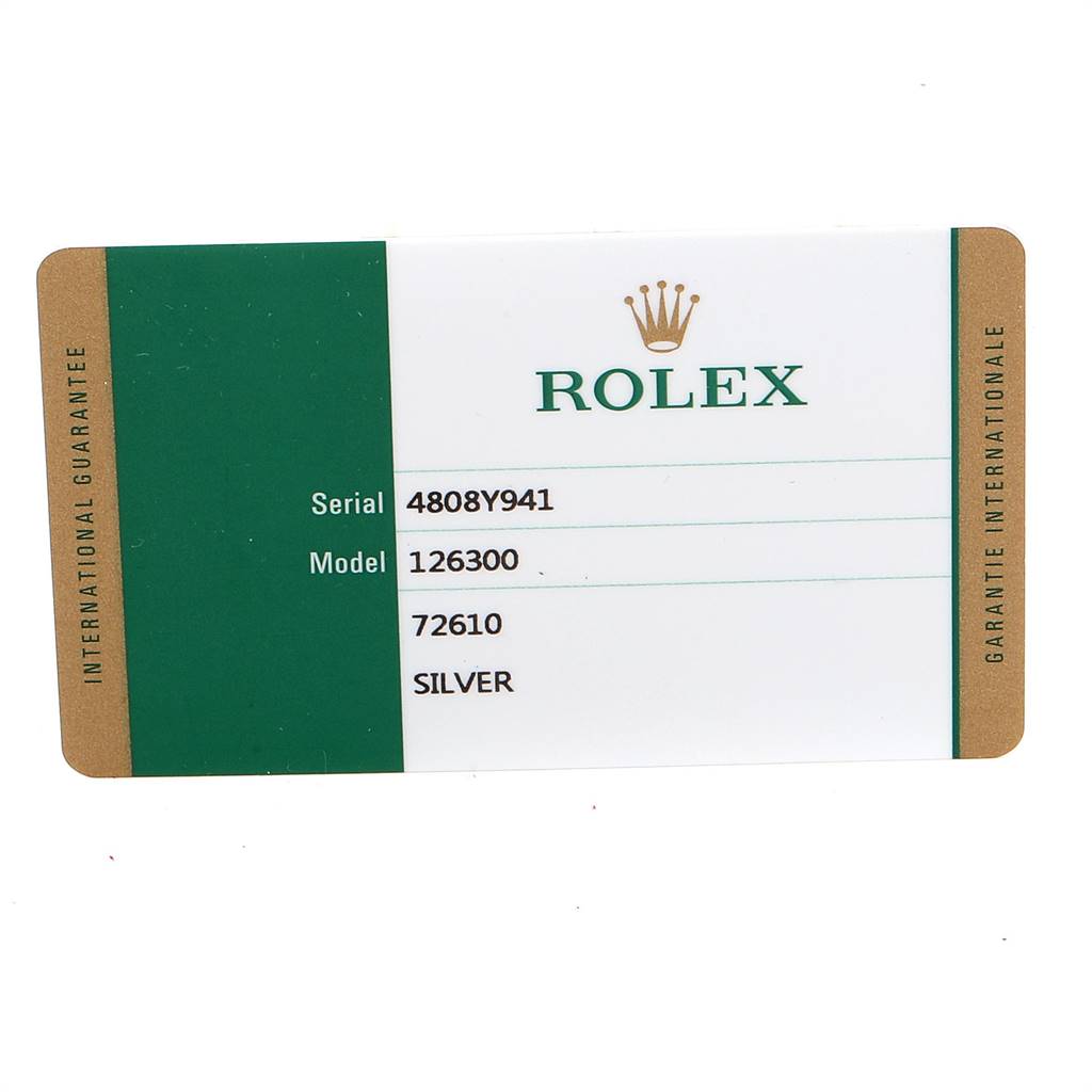 This image shows the international guarantee card for the Rolex Datejust 41 126300 Men
s Stainless Steel Silver Dial 126300 Men
s Stainless Steel Silver Dial model, displaying the serial and model numbers.
