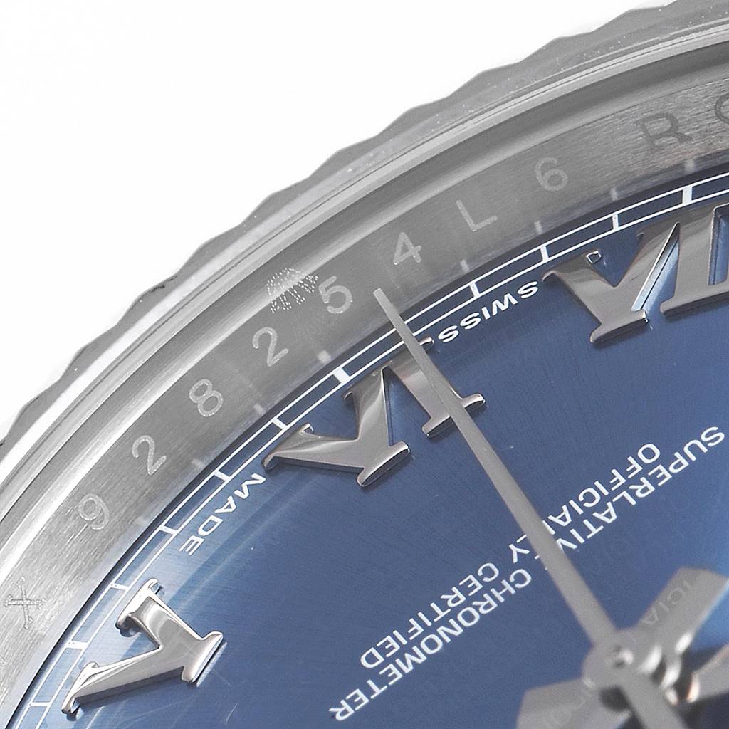 This image shows a close-up of the dial, bezel, and Roman numeral hour markers of the Rolex Datejust 41 116334 Men's Stainless Steel Blue Dial 116334 Men's Stainless Steel Blue Dial watch.