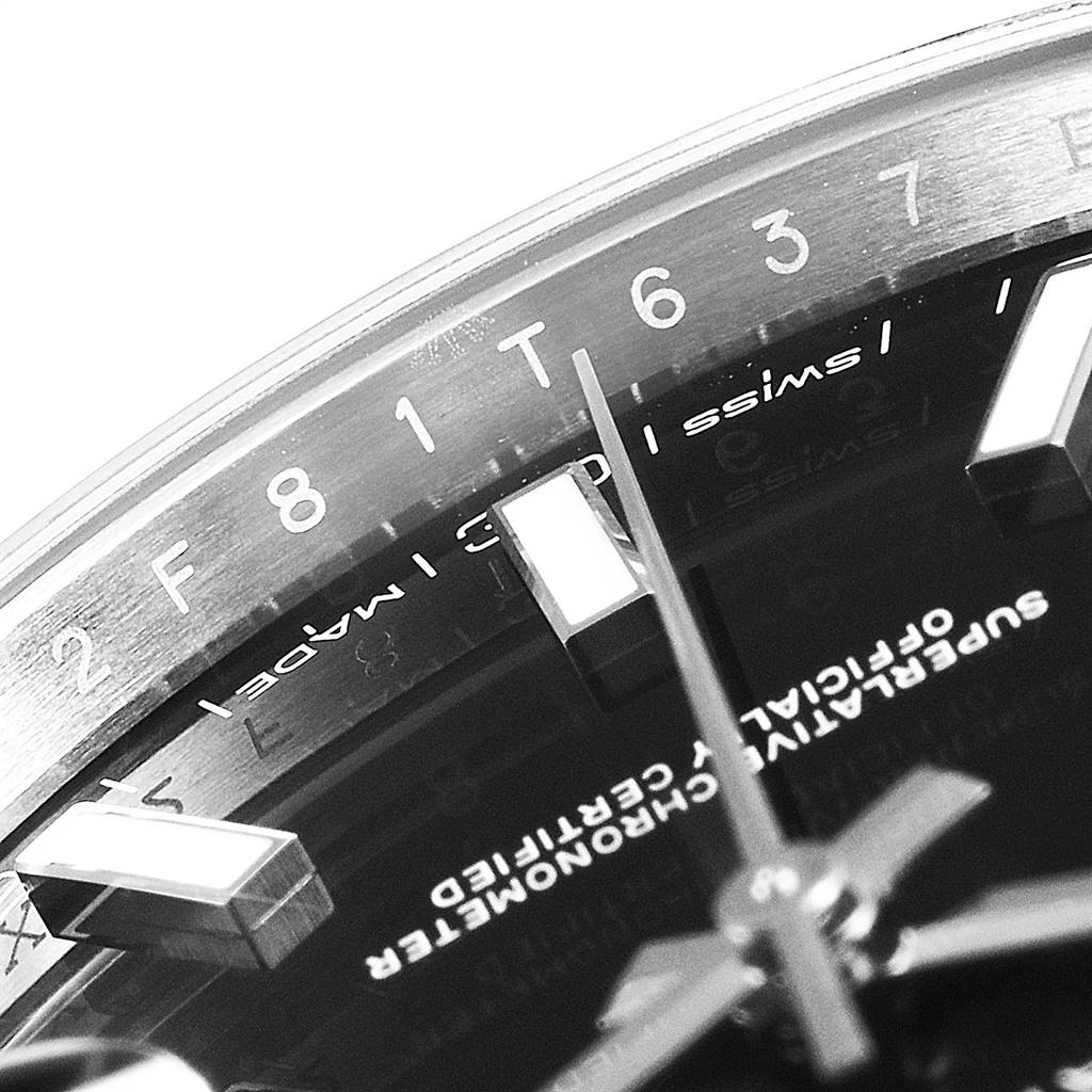 This close-up of the Rolex Datejust 41 126300 Men's Stainless Steel Black Dial 126300 Men's Stainless Steel Black Dial model shows part of the dial and the "Swiss Made" inscription.