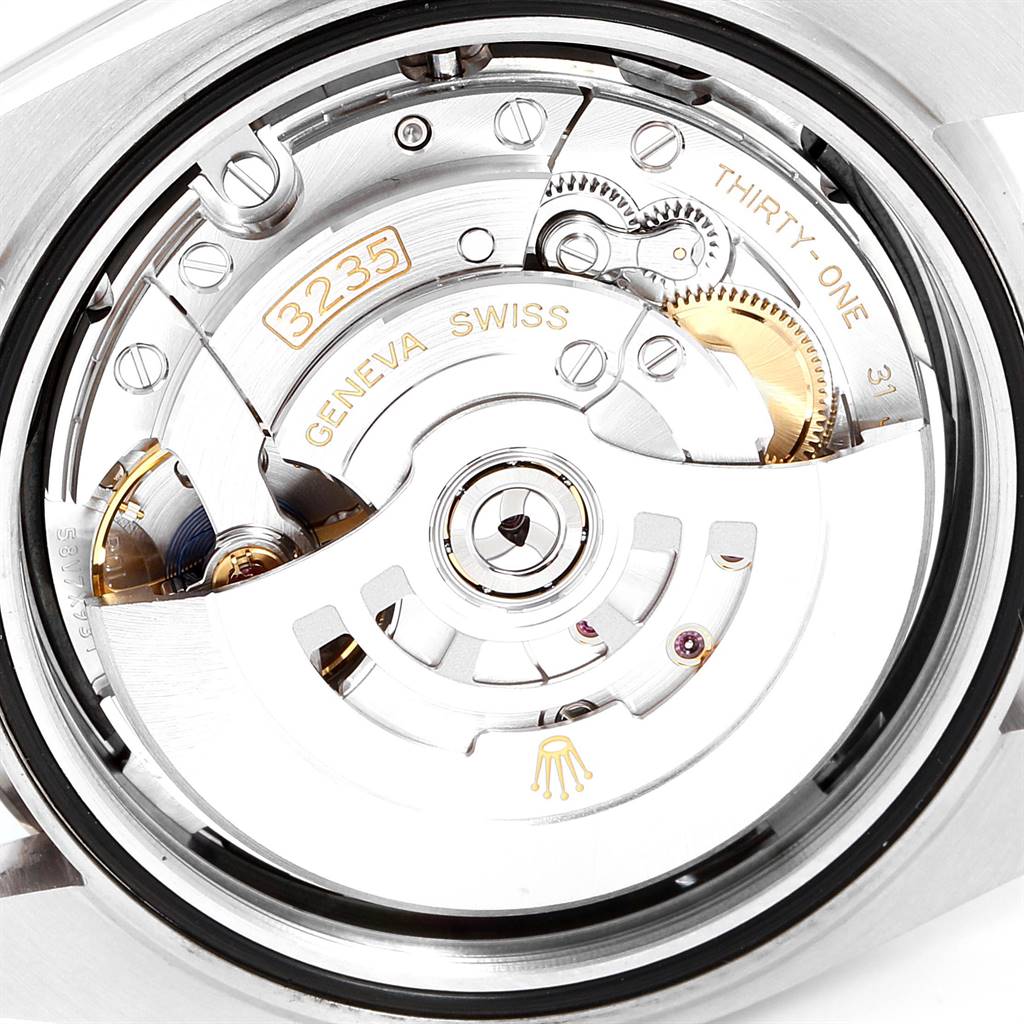 The image shows the back view of the Rolex Datejust 41 126300 Men's Stainless Steel Black Dial 126300 Men's Stainless Steel Black Dial, highlighting its internal movement and mechanism.