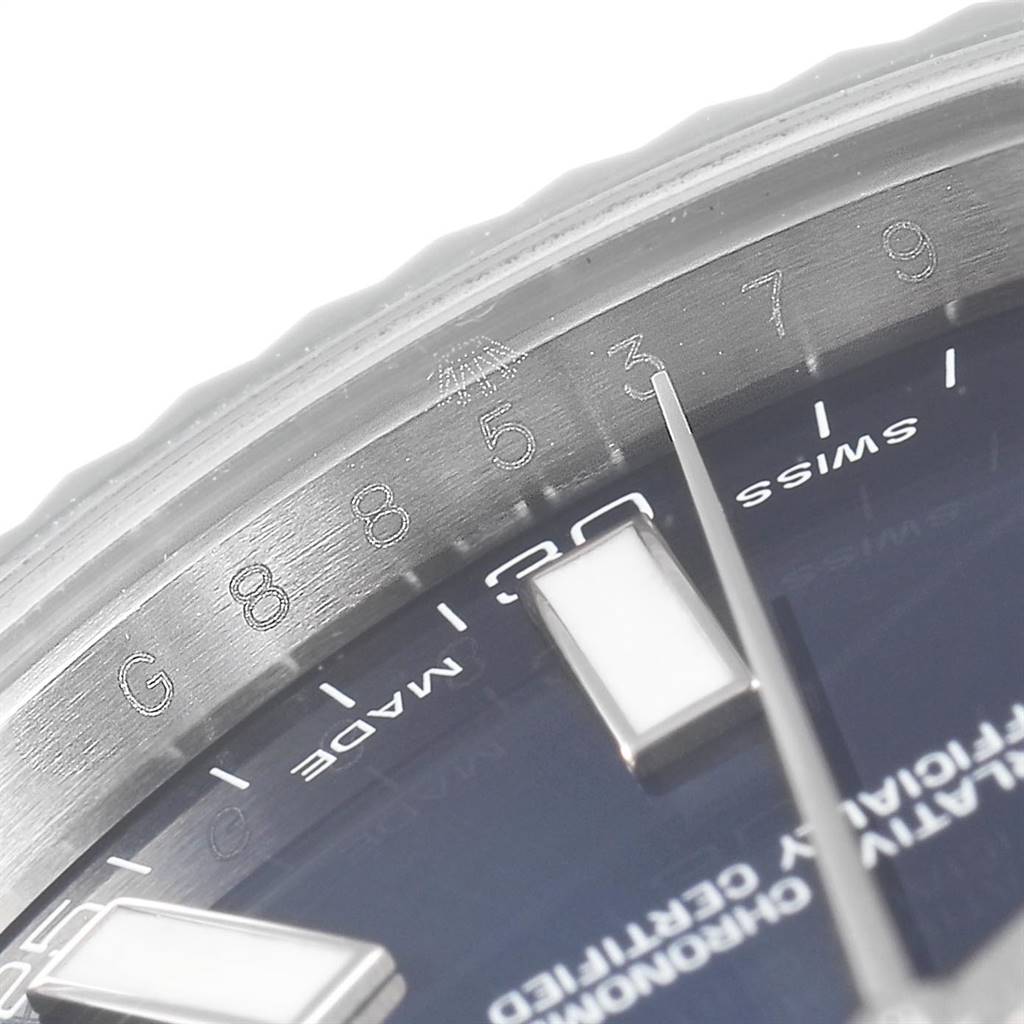 This close-up image shows the dial and part of the bezel of a Rolex Datejust 41 116334 Men's Stainless Steel White Dial 116334 Men's Stainless Steel White Dial watch.