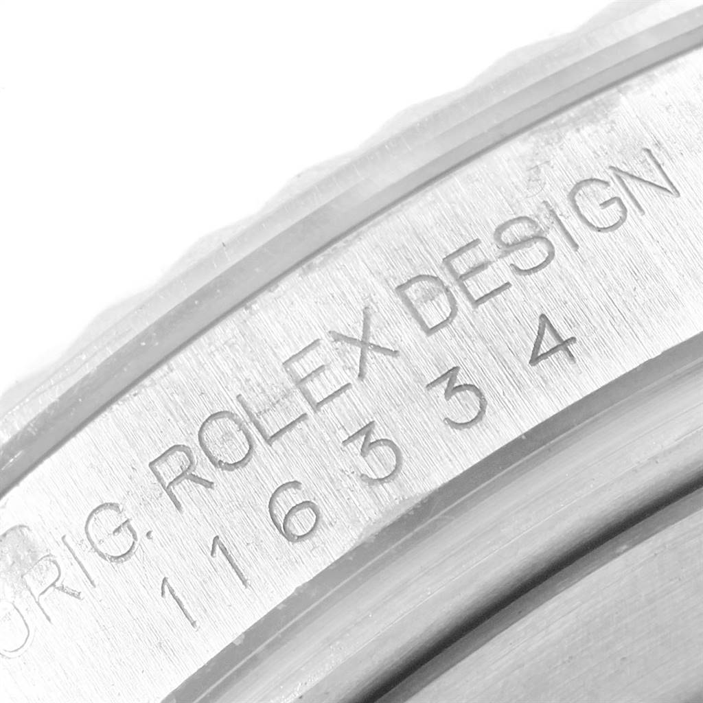 The image shows a close-up of the engraved case back of a Rolex Datejust 41 116334 Men's Stainless Steel White Dial 116334 Men's Stainless Steel White Dial model.