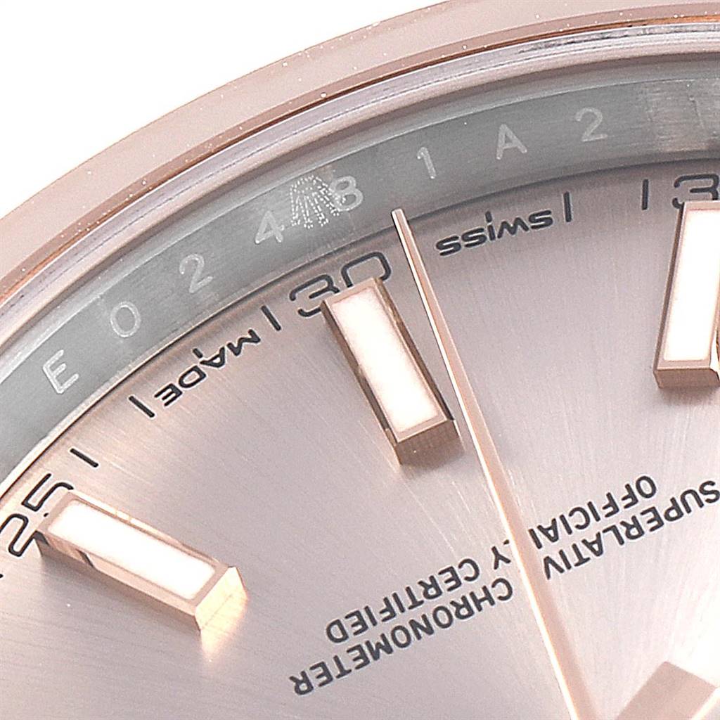 The image shows a close-up of the dial and hour markers of a Rolex Datejust 41 126301 Men's Steel and Gold (two tone) Pink Dial 126301 Men's Steel and Gold (two tone) Pink Dial watch.