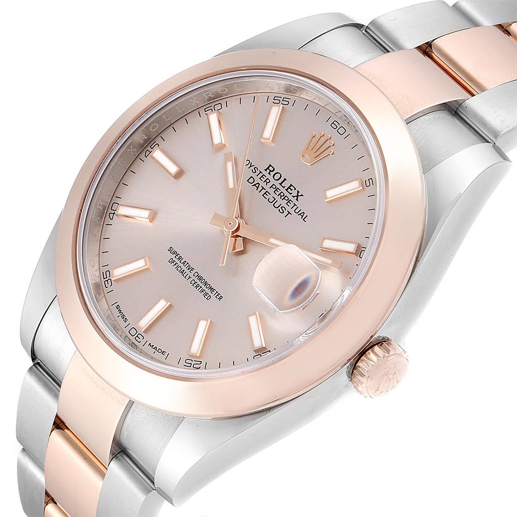This image shows a close-up, angled view of the Rolex Datejust 41 126301 Men's Steel and Gold (two tone) Pink Dial 126301 Men's Steel and Gold (two tone) Pink Dial watch's dial, bezel, crown, and part of the bracelet.