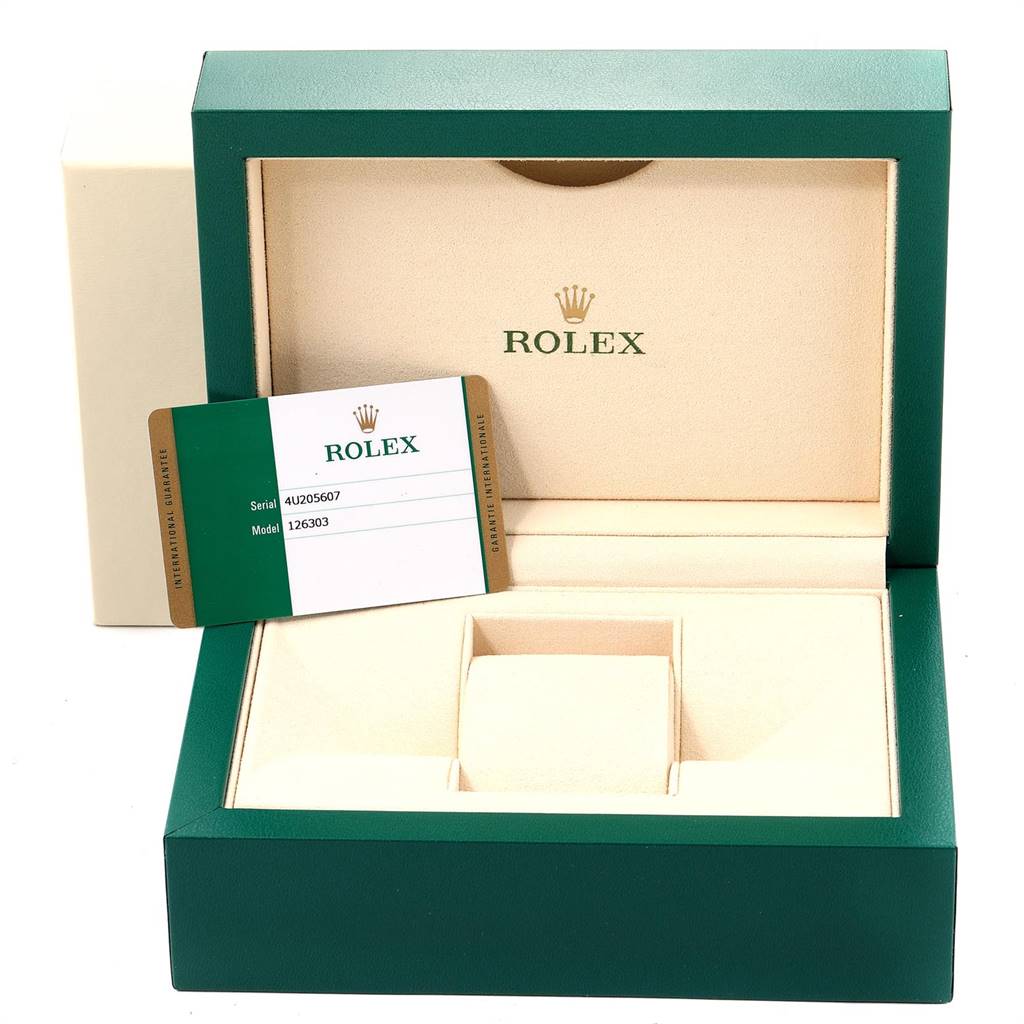 This image shows an open box of a Rolex Datejust 41 126303 Men's Steel and Gold (two tone) Black Dial 126303 Men's Steel and Gold (two tone) Black Dial model, featuring the interior and an ID card.