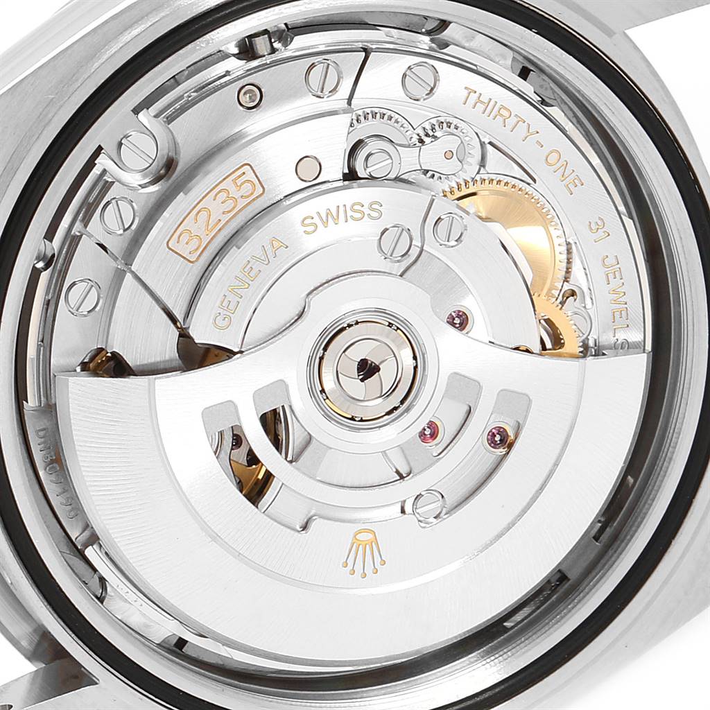 This image shows a close-up of the movement mechanism of a Rolex Datejust 41 126334 Men's Stainless Steel Grey Dial 126334 Men's Stainless Steel Grey Dial watch, highlighting its intricate details and engraving.