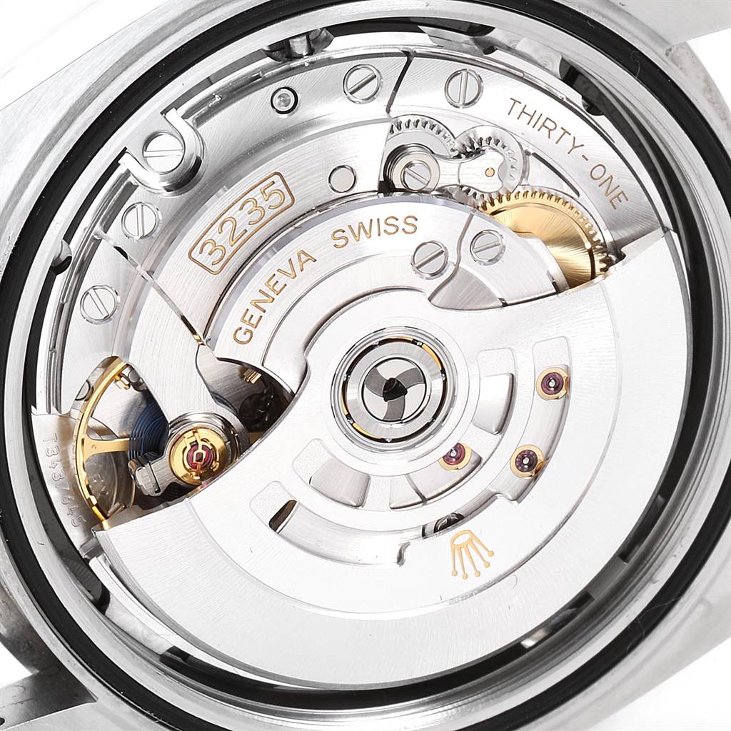 The image shows a close-up view of the movement mechanism inside a Rolex Datejust 41 126334 Men's Stainless Steel Black Dial 126334 Men's Stainless Steel Black Dial watch.