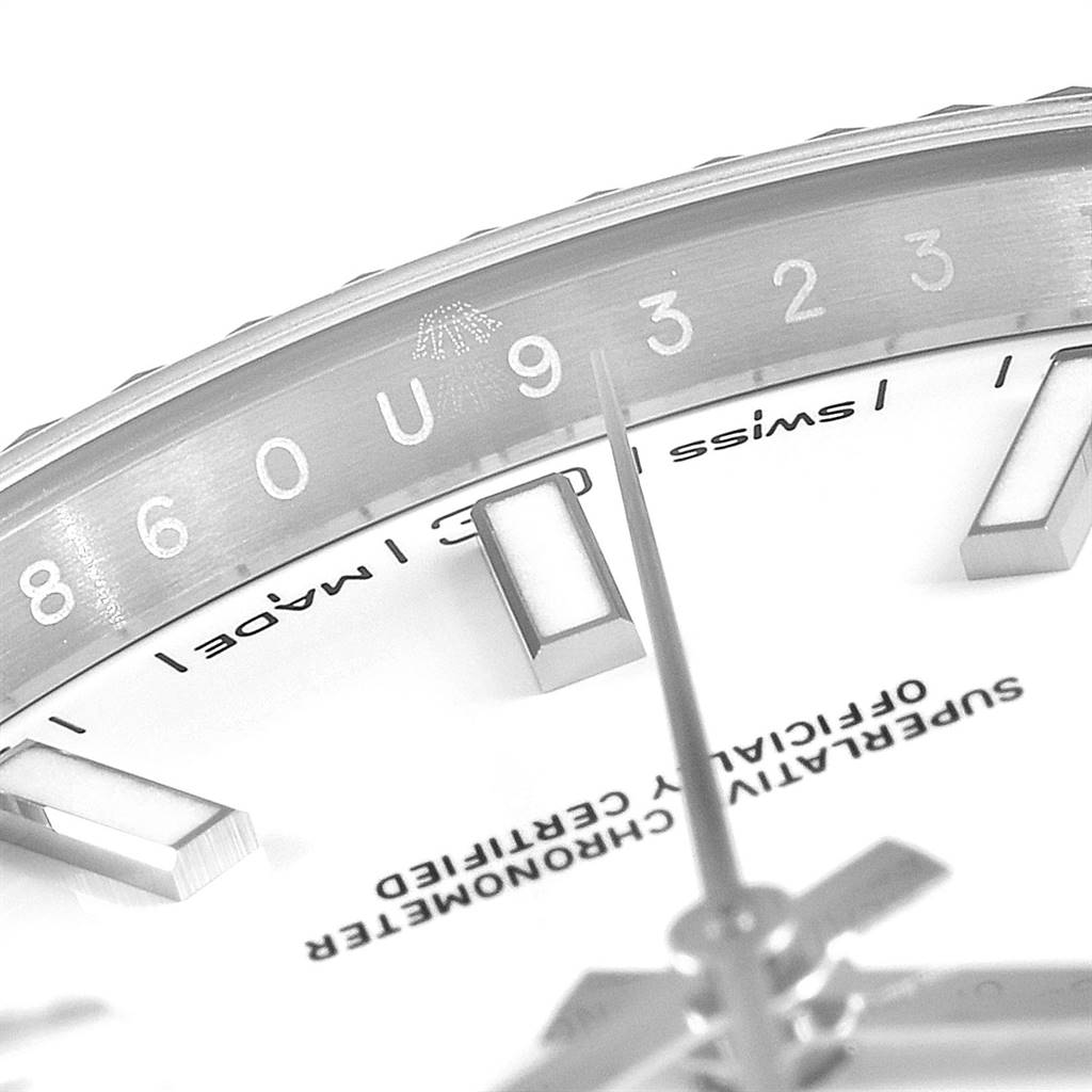 This close-up angle of the Rolex Datejust 41 126300 Men's Stainless Steel White Dial 126300 Men's Stainless Steel White Dial shows the detail of the dial and part of the hour markers.