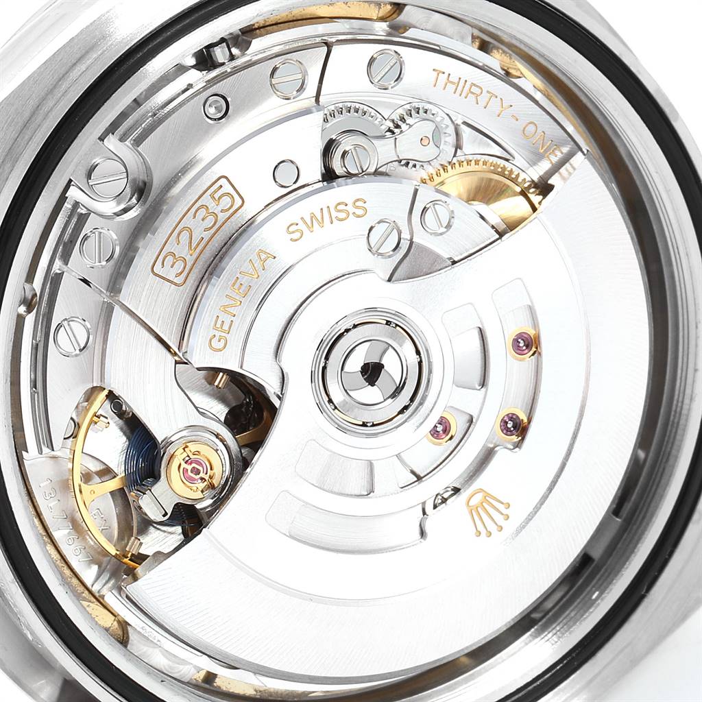 This image shows the movement mechanism of the Rolex Datejust 41 126300 Men's Stainless Steel White Dial 126300 Men's Stainless Steel White Dial watch, with detailed components visible.