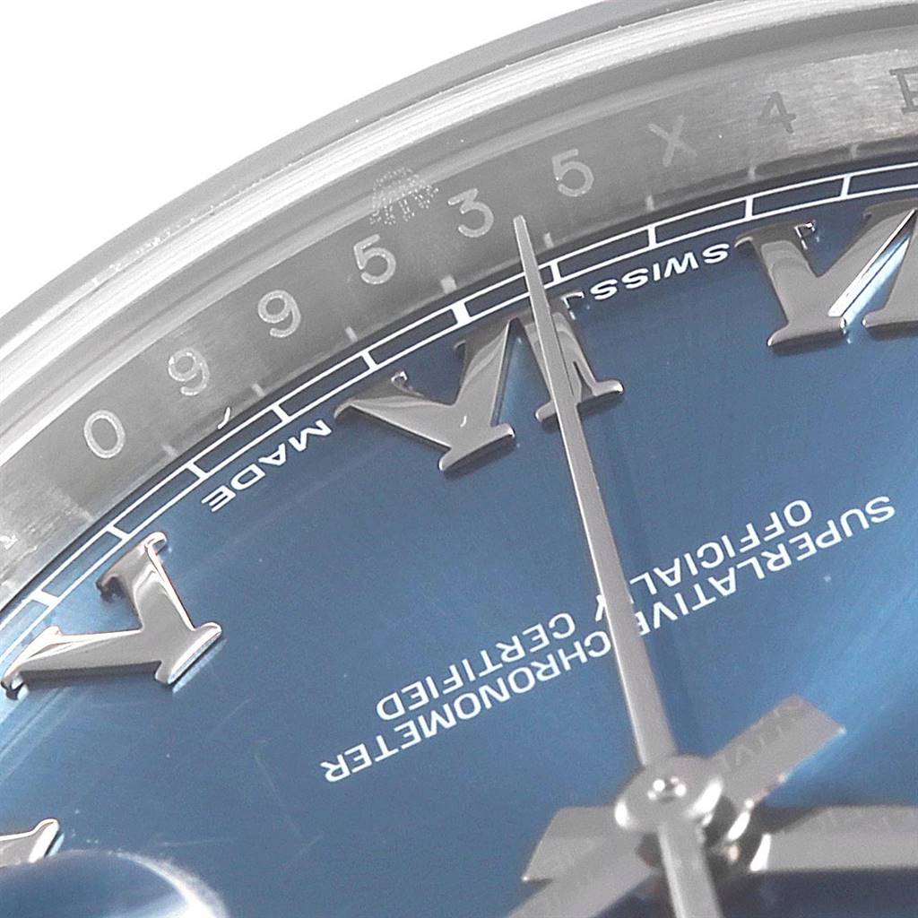 This image shows a close-up angle of the dial, roman numerals, and hands of the Rolex Datejust 41 116300 Men's Stainless Steel Blue Dial 116300 Men's Stainless Steel Blue Dial watch.
