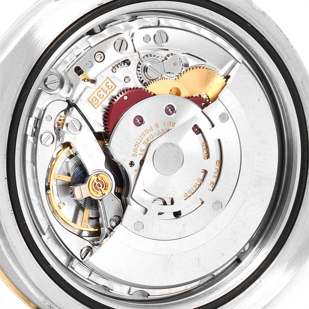 This image shows a close-up view of the movement mechanism inside a Rolex Datejust 41 116333 Men's Steel and Gold (two tone) Grey Dial 116333 Men's Steel and Gold (two tone) Grey Dial watch.