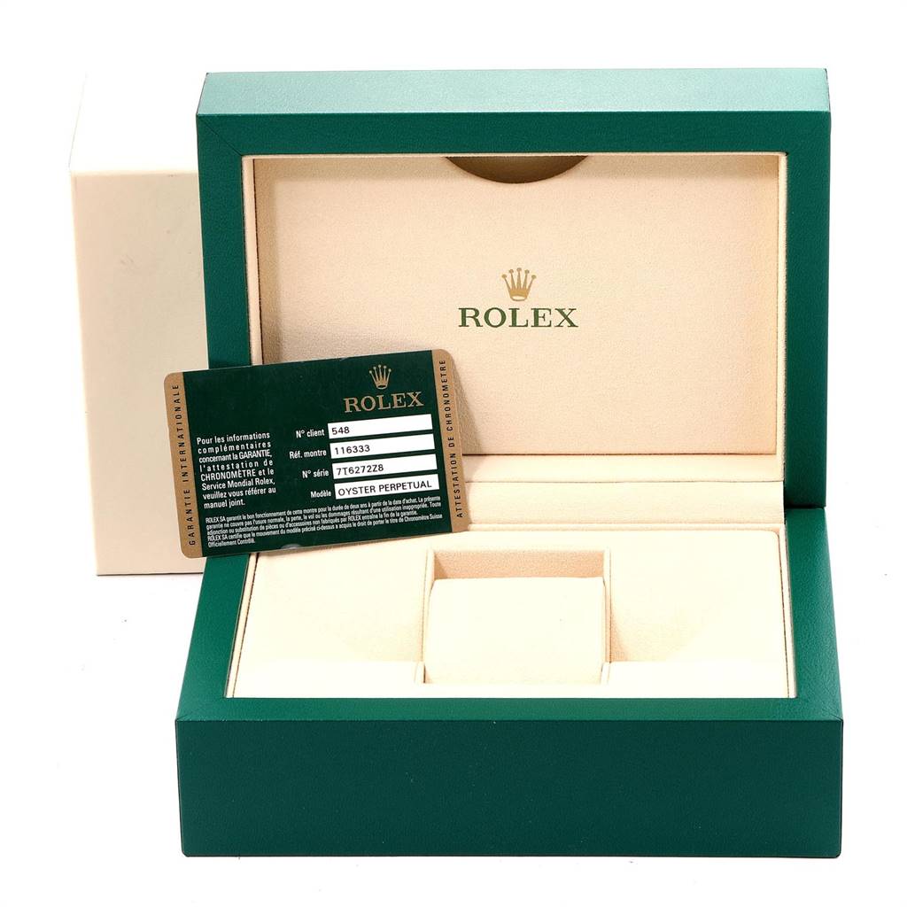 This image shows the open case and international warranty card for a Rolex Datejust 41 116333 Men's Steel and Gold (two tone) Grey Dial 116333 Men's Steel and Gold (two tone) Grey Dial watch.