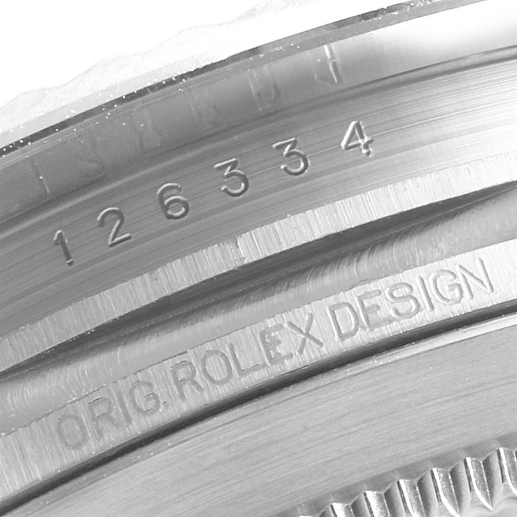 Close-up of the model number and "Orig. Rolex Design" engravings on the Rolex Datejust 41 126334 Men's Stainless Steel White Dial 126334 Men's Stainless Steel White Dial watch.