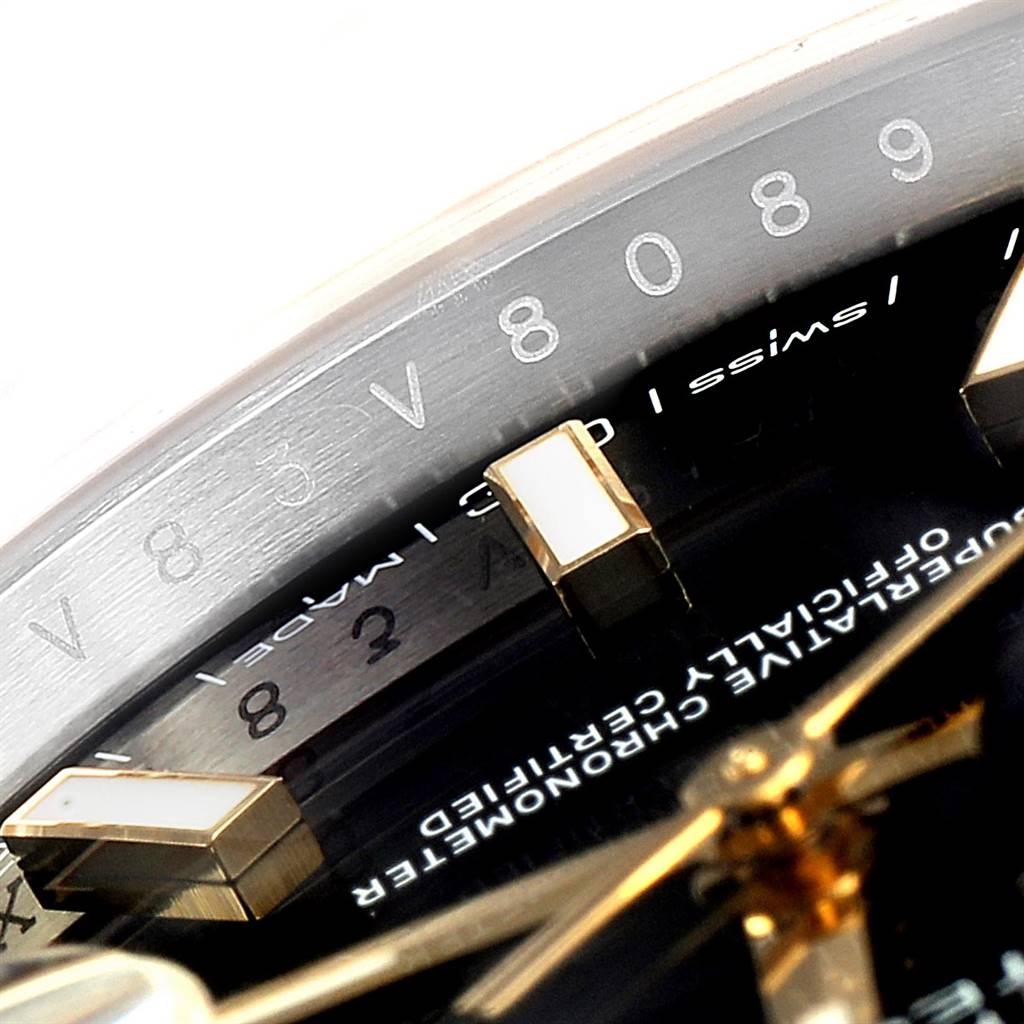 This close-up shows the dial, hour markers, and part of the minute hand on the Rolex Datejust 41 126303 Men's Steel and Gold (two tone) Black Dial 126303 Men's Steel and Gold (two tone) Black Dial watch.
