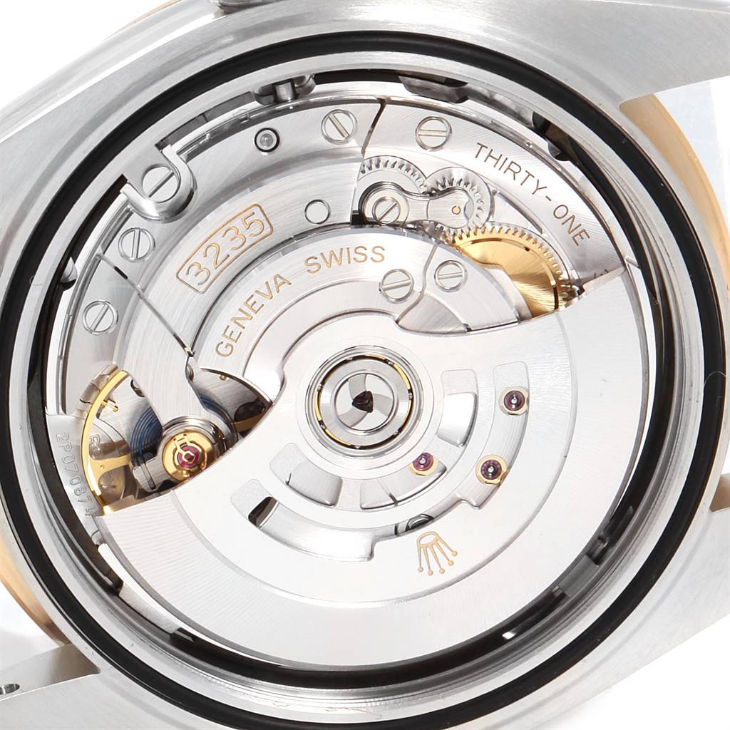 This is an image showing the movement mechanism of a Rolex Datejust 41 126303 Men's Steel and Gold (two tone) Black Dial 126303 Men's Steel and Gold (two tone) Black Dial watch from a top angle.