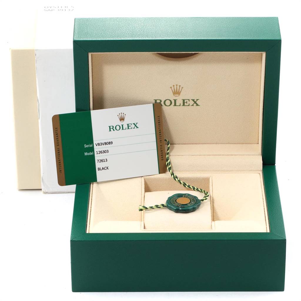 This image shows the box and authenticity card for a Rolex Datejust 41 126303 Men's Steel and Gold (two tone) Black Dial 126303 Men's Steel and Gold (two tone) Black Dial model watch.
