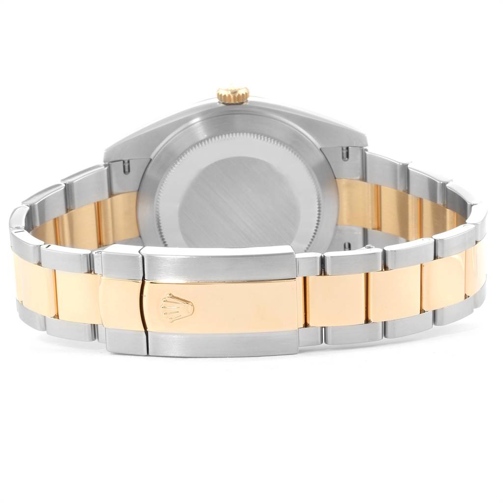 The image shows the back case and clasp of a Rolex Datejust 41 126303 Men's Steel and Gold (two tone) Black Dial 126303 Men's Steel and Gold (two tone) Black Dial watch at an angle emphasizing the two-tone bracelet.