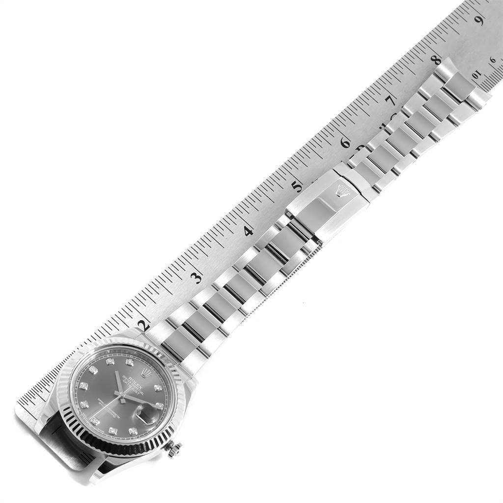 The image shows a side view of a Rolex Datejust 41 116334 Men's Stainless Steel Silver Dial 116334 Men's Stainless Steel Silver Dial model watch being measured with a ruler, highlighting its face and bracelet.