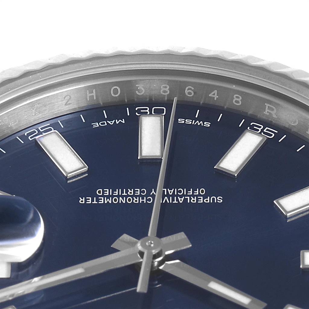 The image shows a close-up of the dial and bezel of a Rolex Datejust 41 116334 Men's Stainless Steel Blue Dial 116334 Men's Stainless Steel Blue Dial watch, highlighting the hands and hour markers.