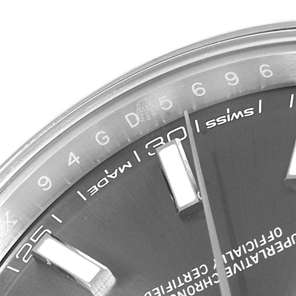 This close-up image shows the dial and part of the bezel of a Rolex Datejust 41 126300 Men's Stainless Steel Grey Dial 126300 Men's Stainless Steel Grey Dial watch.