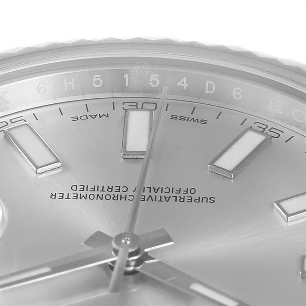 The image shows a close-up of the dial of a Rolex Datejust 41 116334 Men's Stainless Steel Silver Dial 116334 Men's Stainless Steel Silver Dial, focusing on the hour markers, minute hand, text, and part of the bezel.