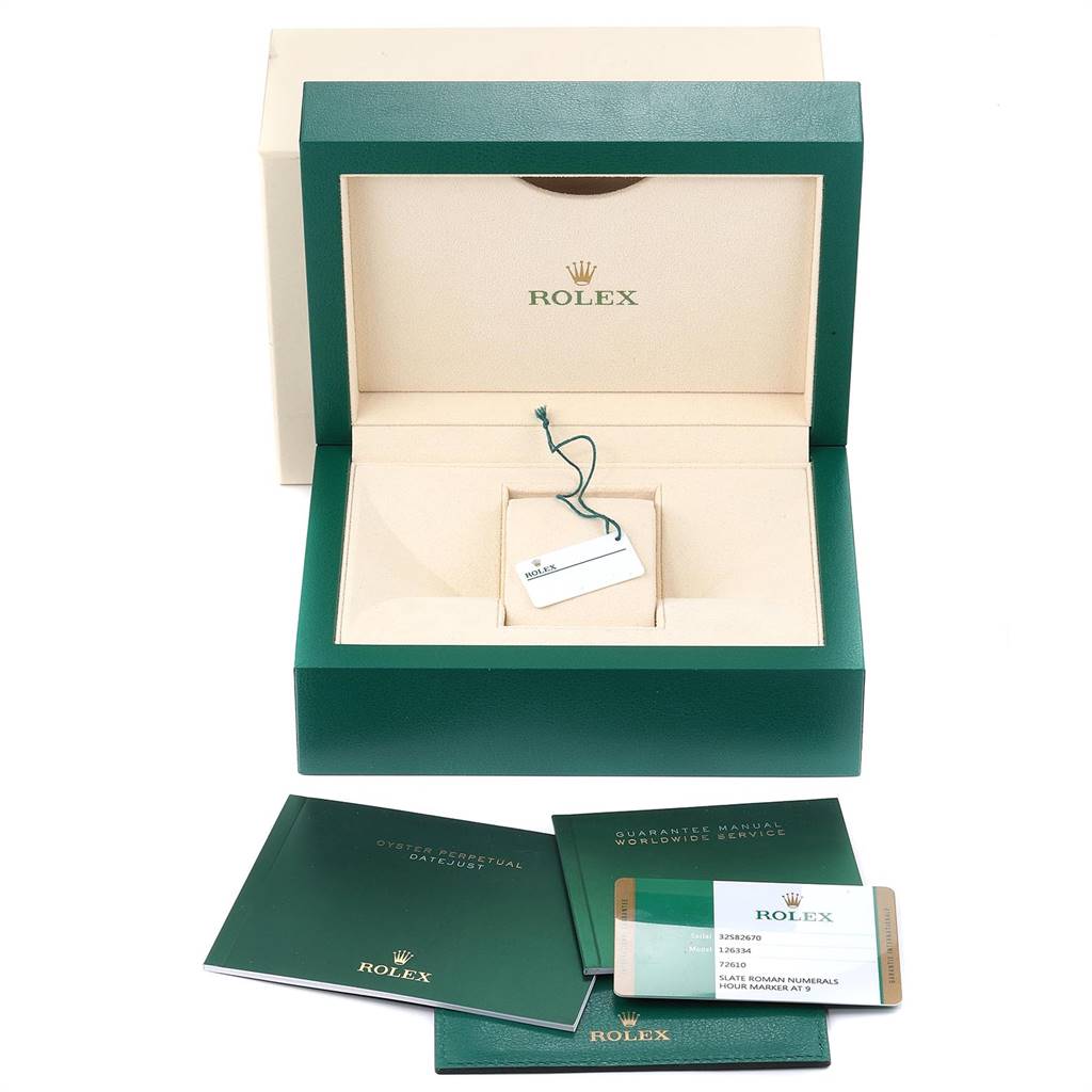 The image shows the packaging and accessories for a Rolex Datejust 41 126300 Men's Stainless Steel Grey Dial 126300 Men's Stainless Steel Grey Dial, including manuals, a warranty card, and a tag.