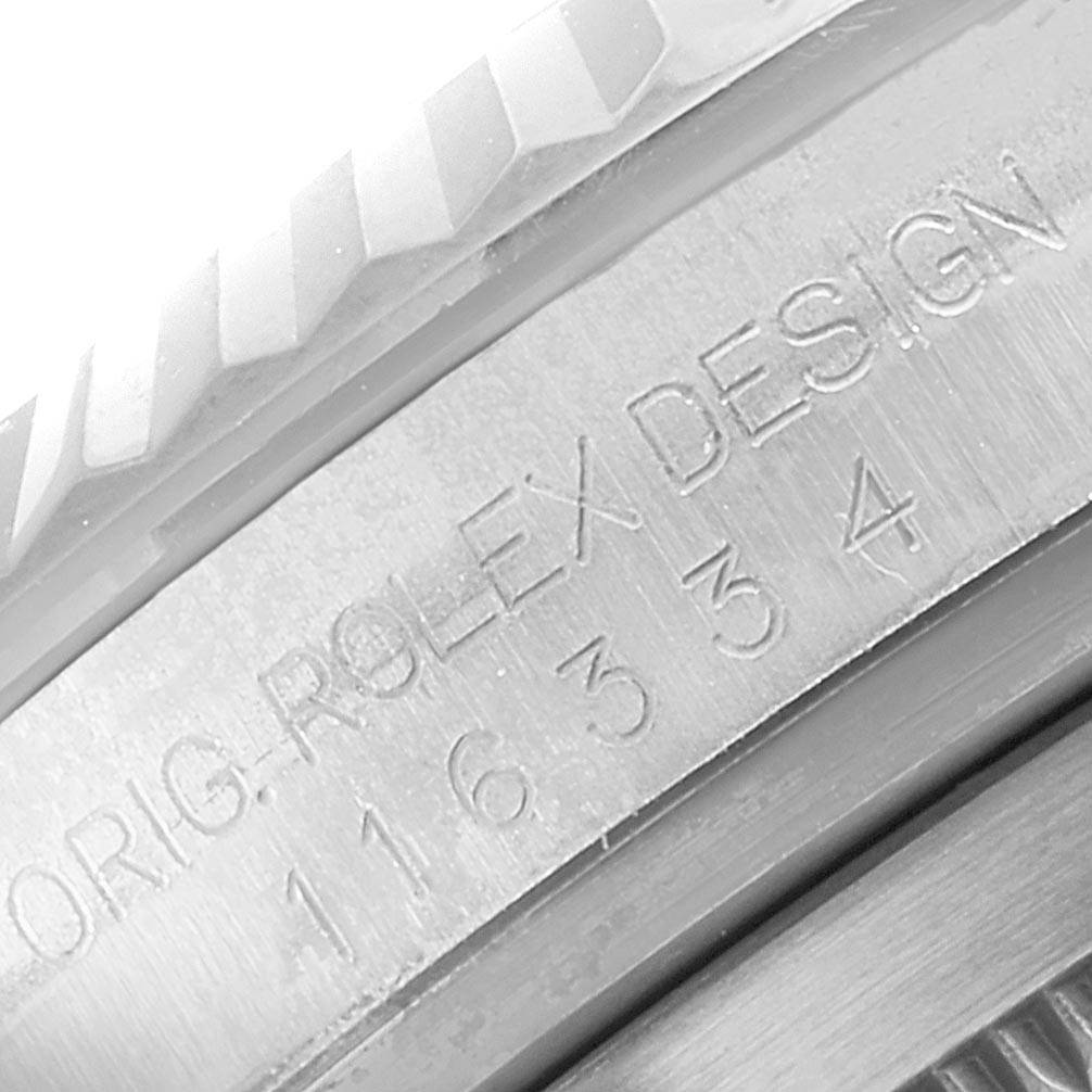 This close-up image of the Rolex Datejust 41 116334 Men
s Stainless Steel Blue Dial 116334 Men
s Stainless Steel Blue Dial model shows the engraved inner bezel with the brand name and model number.