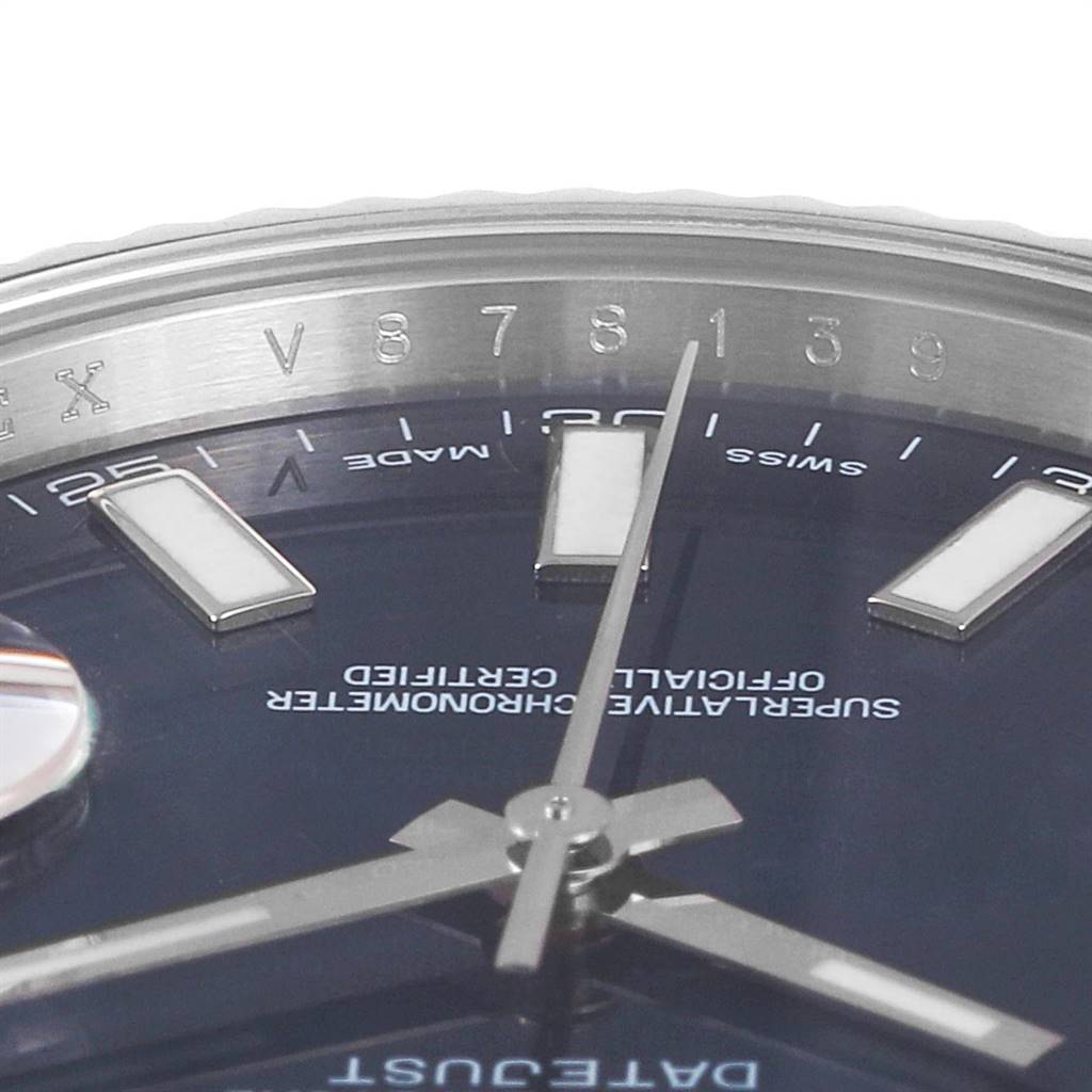 The image shows a close-up of the dial and part of the bezel of the Rolex Datejust 41 116334 Men's Stainless Steel Blue Dial 116334 Men's Stainless Steel Blue Dial watch, highlighting the hands and hour markers.