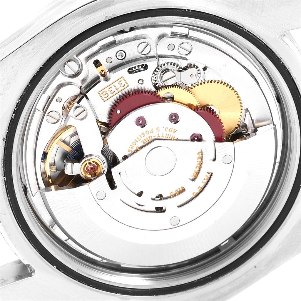 This image shows a close-up view of the movement mechanism inside a Rolex Datejust 41 116334 Men's Stainless Steel Blue Dial 116334 Men's Stainless Steel Blue Dial watch.