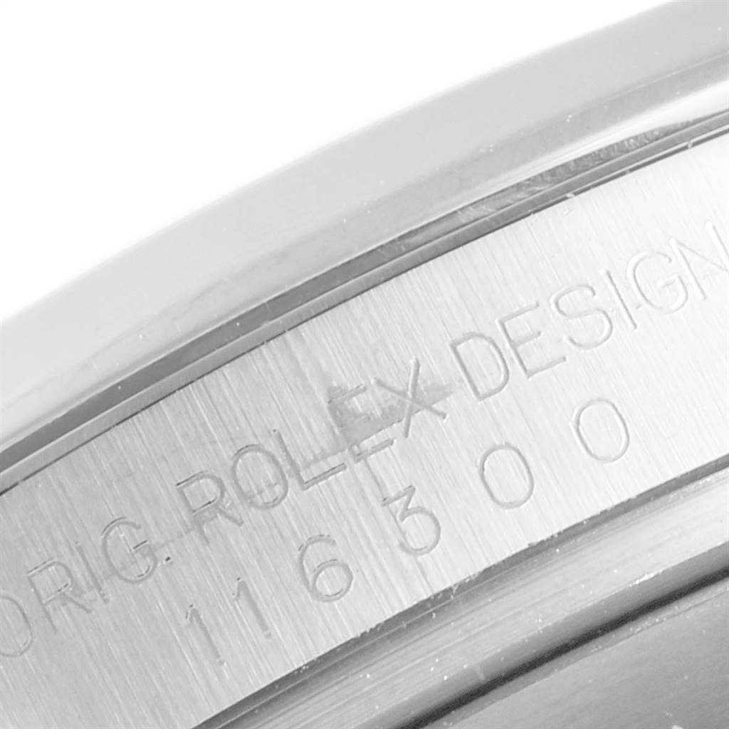 The image shows a close-up of the case side of a Rolex Datejust 41 116300 Men's Stainless Steel Blue Dial 116300 Men's Stainless Steel Blue Dial, highlighting its engraving.