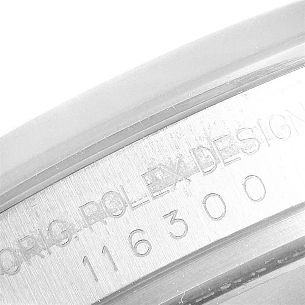 The image shows a close-up of the case with visible engraving on the Rolex Datejust 41 116300 Men's Stainless Steel Black Dial 116300 Men's Stainless Steel Black Dial watch.