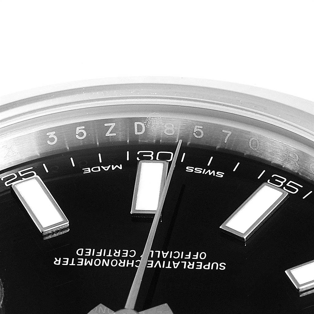 This image shows a close-up of the dial and bezel area of a Rolex Datejust 41 116300 Men's Stainless Steel Black Dial 116300 Men's Stainless Steel Black Dial, focusing on the hour markers and minute markings.