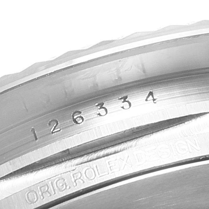 This image shows a close-up of the engraved model number and "Orig. Rolex Design" on the case of a Rolex Datejust 41 126334 Men's Stainless Steel Grey Dial 126334 Men's Stainless Steel Grey Dial.