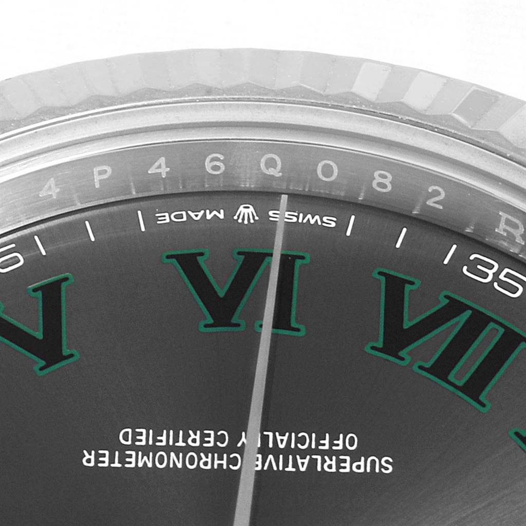 This close-up image of the Rolex Datejust 41 126334 Men's Stainless Steel Grey Dial 126334 Men's Stainless Steel Grey Dial shows the upper portion of the dial, including Roman numerals and the "Swiss Made" text.