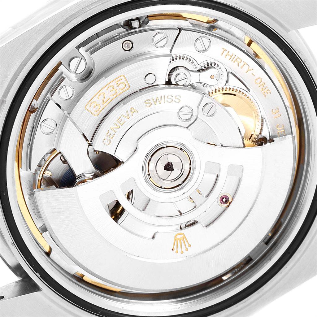 The image shows the intricate internal movement of a Rolex Datejust 41 126300 Men's Stainless Steel Blue Dial 126300 Men's Stainless Steel Blue Dial watch, specifically the caliber 3235 mechanism.