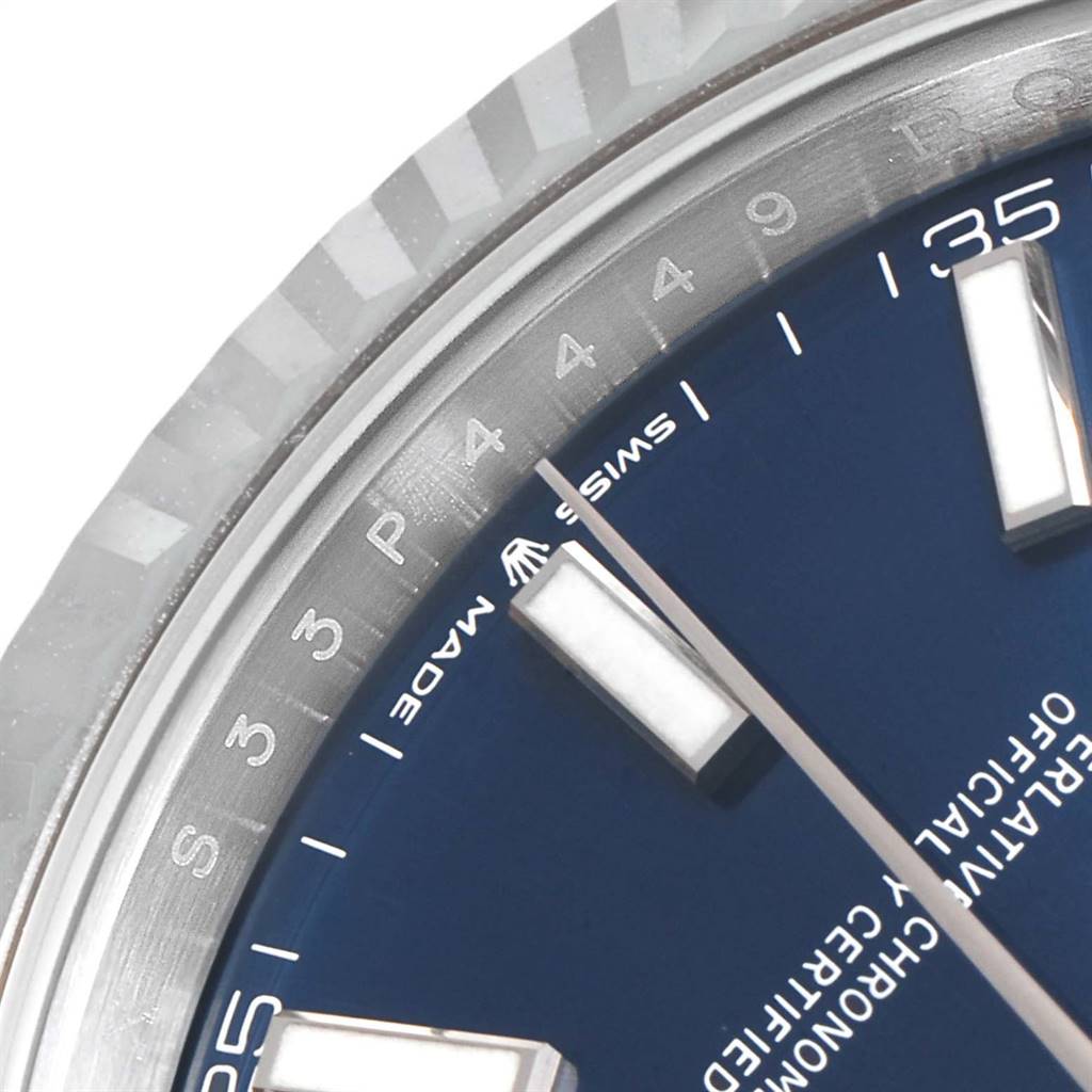 The image shows a close-up of the dial and fluted bezel of a Rolex Datejust 41 126334 Men's Stainless Steel Blue Dial 126334 Men's Stainless Steel Blue Dial watch.