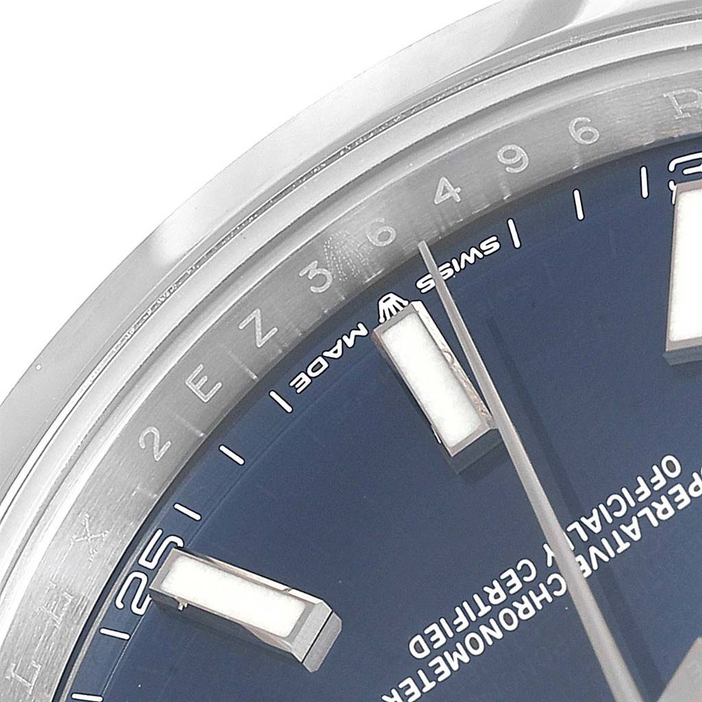 The image shows a close-up of the dial and bezel of a Rolex Datejust 41 126300 Men's Stainless Steel Blue Dial 126300 Men's Stainless Steel Blue Dial, highlighting the markers, hands, and "Swiss Made" text.