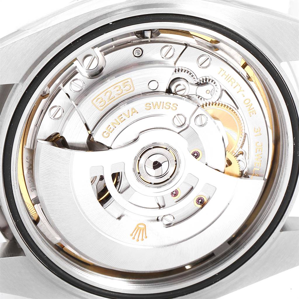 This image shows a close-up view of the Rolex Datejust 41 126300 Men's Stainless Steel Blue Dial 126300 Men's Stainless Steel Blue Dial's movement from the back, highlighting the intricate mechanism.