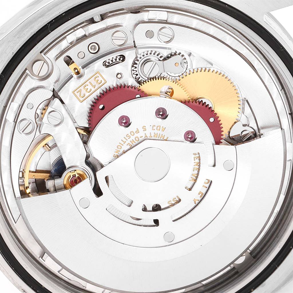 This image shows a close-up view of the mechanical movement inside a Rolex Datejust 41 114300 Men's Stainless Steel White Dial 114300 Men's Stainless Steel White Dial watch.