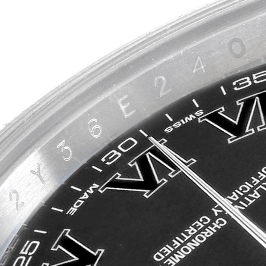This close-up image of the Rolex Datejust 41 116300 Men's Stainless Steel Grey Dial 116300 Men's Stainless Steel Grey Dial watch shows a segment of the dial, including the Roman numeral VI, minute markers, and part of the bezel.