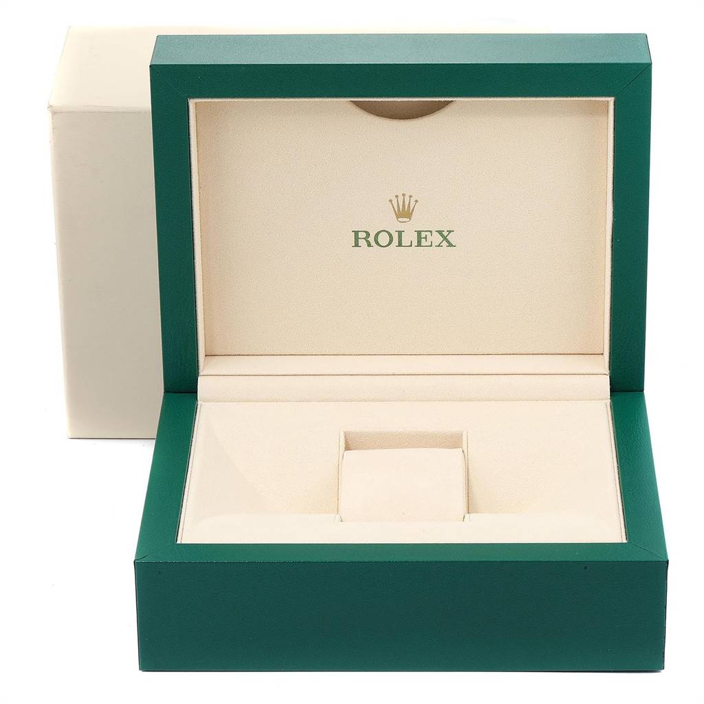 This is an image of a green and beige Rolex Datejust 41 116334 Men's Stainless Steel Silver Dial 116334 Men's Stainless Steel Silver Dial watch box with the brand logo inside.