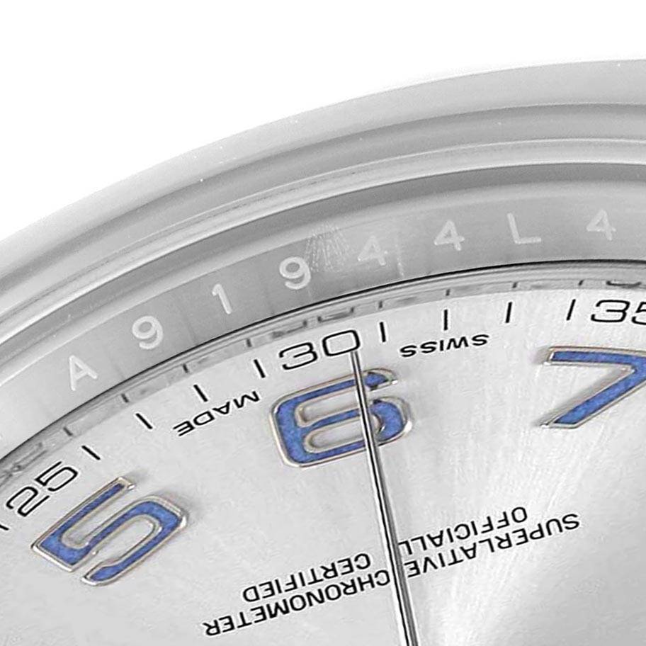 The image shows a close-up of the Rolex Datejust 41 116300 Men's Stainless Steel Silver Dial 116300 Men's Stainless Steel Silver Dial's dial, including the hour markers, minute markers, and part of the second hand.