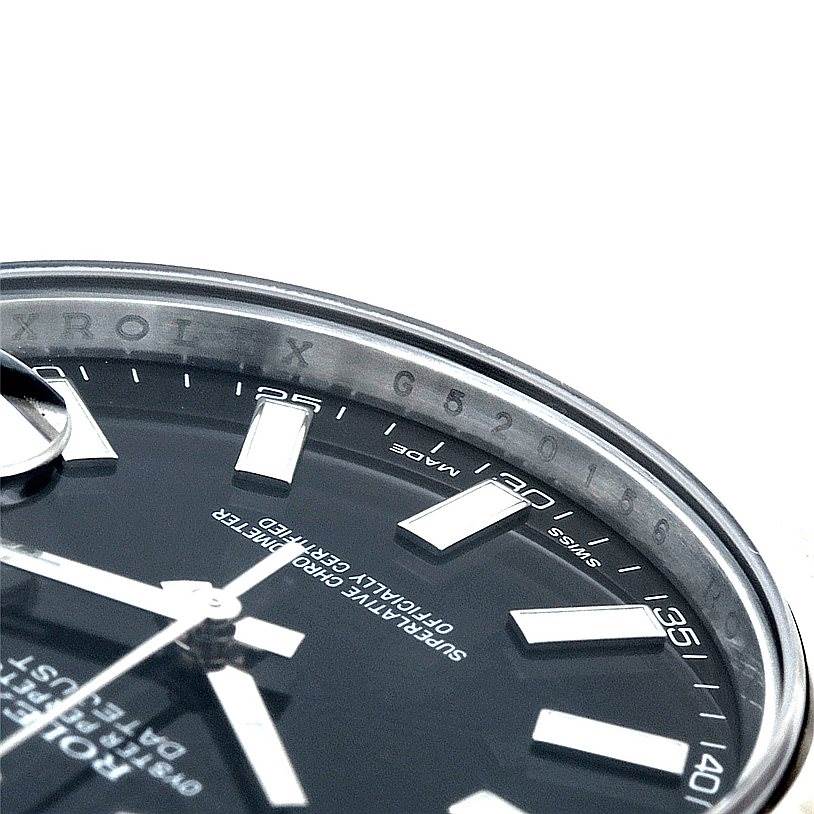 This image shows a close-up angled view of the face and dial of a Rolex Datejust 41 116334 Men's Stainless Steel Black Dial 116334 Men's Stainless Steel Black Dial watch.