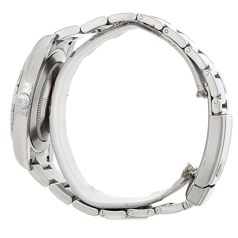 This side view of the Rolex Datejust 41 116334 Men's Stainless Steel Black Dial 116334 Men's Stainless Steel Black Dial watch shows its case, crown, and metal bracelet.