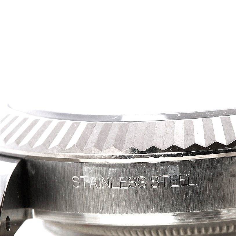 The image shows a close-up of the stainless steel bezel and case side of the Rolex Datejust 41 116334 Men's Stainless Steel Black Dial 116334 Men's Stainless Steel Black Dial watch.
