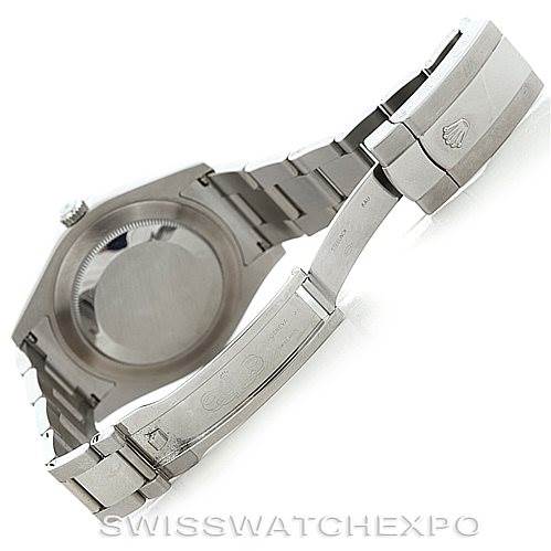 This is an angled view of the Rolex Datejust 41 116300 Men's Stainless Steel Blue Dial 116300 Men's Stainless Steel Blue Dial watch showing the back case and open clasp of the bracelet.